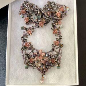 Signed COLLEEN TOLAND vintage necklace w/pink, purple, flowers and green beads.